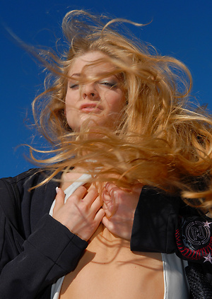 Hot blond girl posing naked