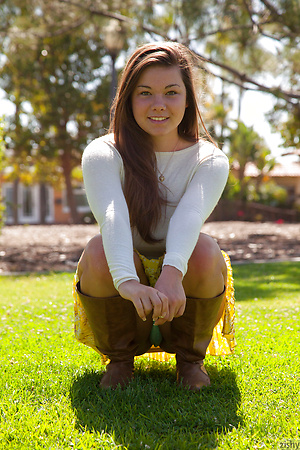 Adorable teen Nikki Yann flashes panty upskirt & teases with big tits outdoors