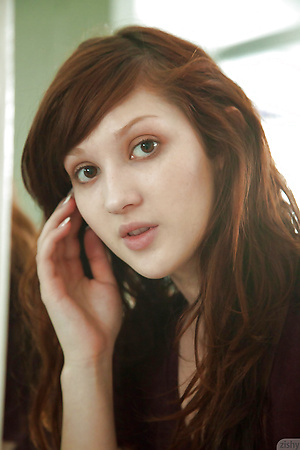 Cute redhead amateur Ellena Woods spreading her legs on her bed