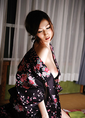 Julia Asian is so erotic while exposing big cans out of wrapper