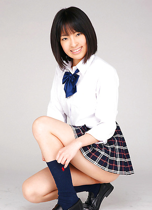 An Mashiro Asian shows nasty behind under school uniform skirt