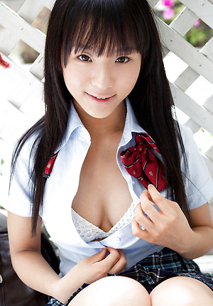 Miho Morita Asian takes school uniform off and shows body outdoor