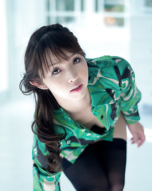 Neo Asian in long dress goes to enjoy reading book in the forest