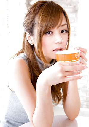 Beautiful Jun Natsukawa in a cute business suit and stockings