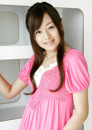 Beautiful gravure idol is adorable in cute little pink dress
