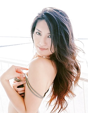 Radiant asian beauty looks incredible in her lace lingerie