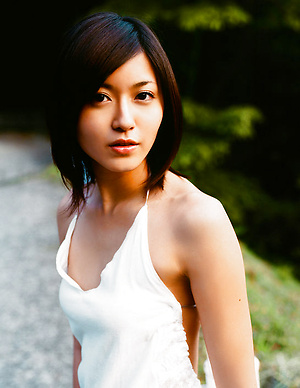 Lovely asian hottie is enthralling in her little bikini