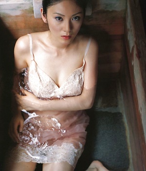 Sexy gravure idol entices in her provacative pink lace lingerie