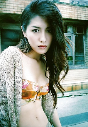 Enchanting asian beauty is incredibly stunning in her bikini