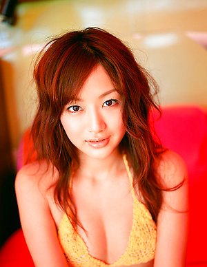 Enticing asian fox is gorgeous in her bikini at the beach