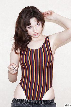 Sexy brunette showing off her cute body suit