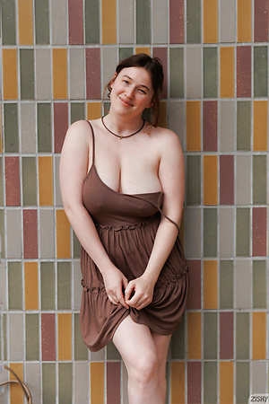 Sexy amateur babe Riley Nixon flashes her big tits & ass in public