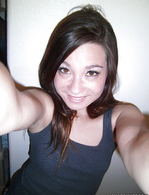 Perfect petite girlfriend takes selfshot pictures for her boyfriend in the bathroom at school