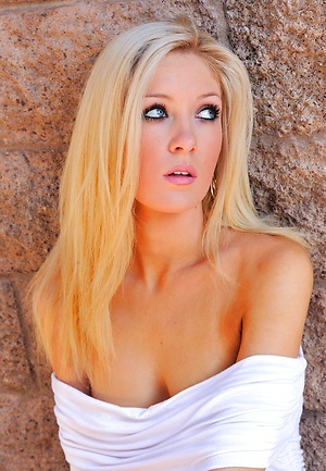 Emily strips from her white dress